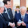 Marc Wheat presenting a reprentation of the Germanna Visitor Center to Buzz Aldrin